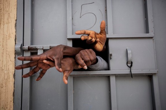 Libya has become a modern-day slave market, keeping migrants at the mercy of a complex trafficking web tolerated by the country's many militia groups, an issue largely ignored by the world, a Pulitzer Prize-winning photographer said on Wednesday. Narciso