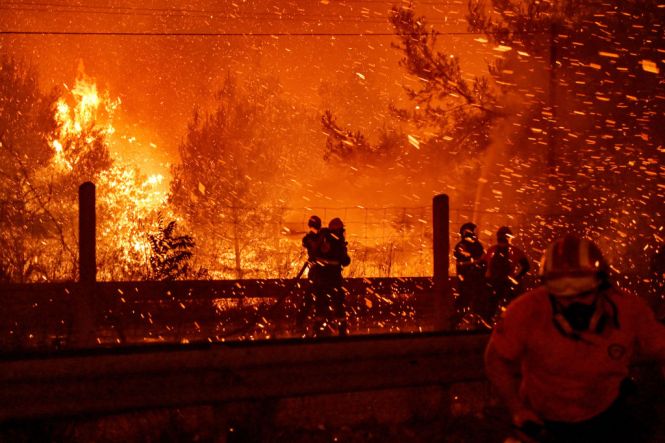 Athens Suburb Engulfed In Flames During Heatwave