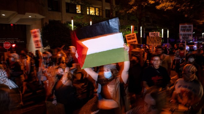 1-Pro-Palestinian demonstrators march back to George Washington University's University Yard on May 7, 2024 in Washington, DC-afp